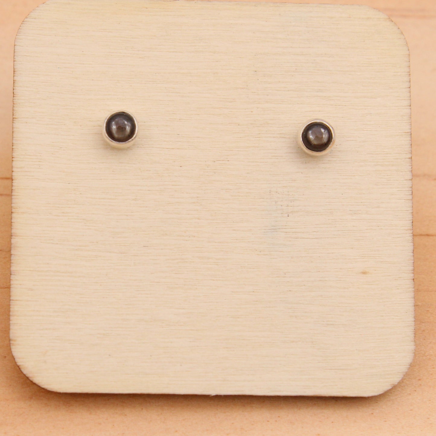 #3081 Small Black Star Sapphire Stud Earrings