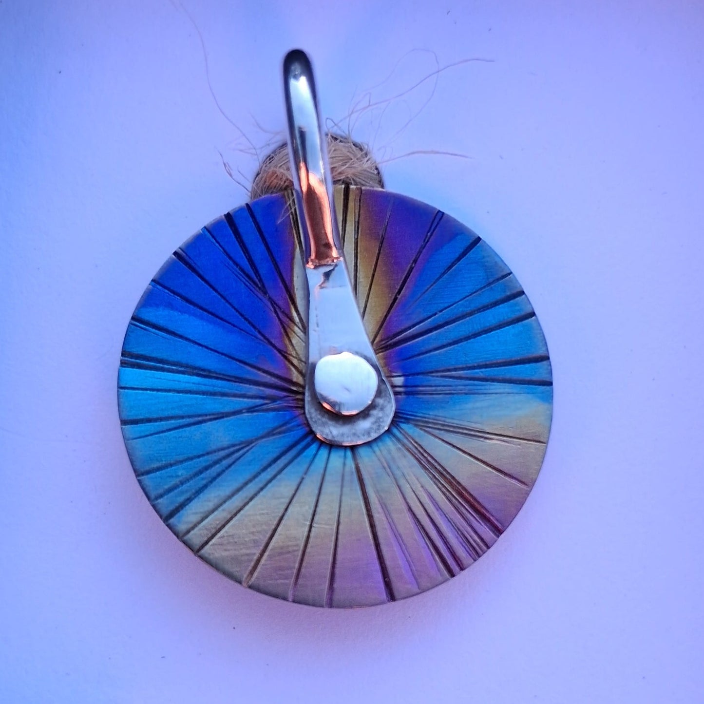 Anodized Titanium and Silver Riveted Pendant