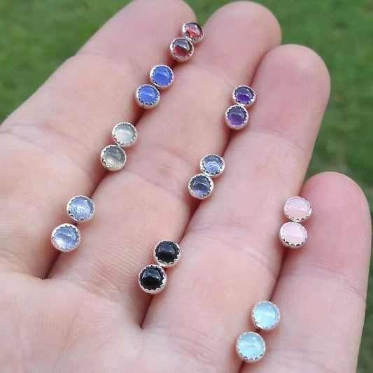 4mm Kyocera White Opal Stud Earrings with Serrated Setting