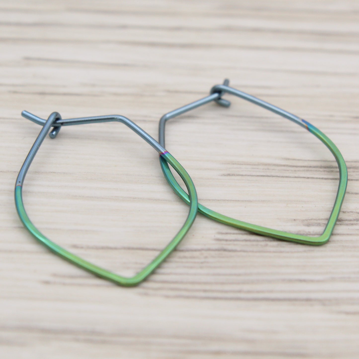 #3128 Silver and Green Niobium Lotus Leaf Hoops